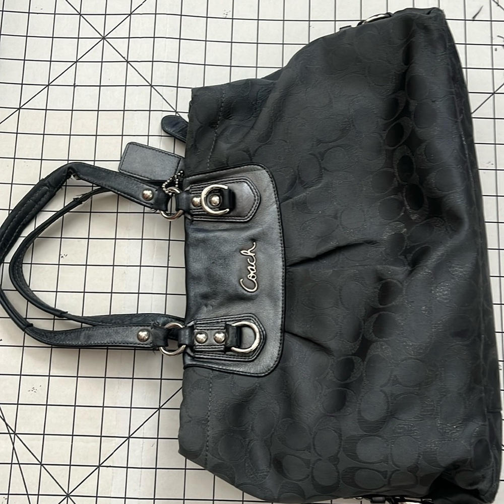 Coach bag. Stylish, perfect size. See photos for areas of previous use.